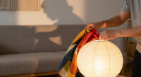 She Draped A Scarf Over IKEA’s Paper Lantern, And It Looks Custom